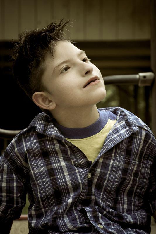 9 years ago, I met my biological father, and I found out that I had little brothers. 3 days after meeting them, our father asked if they could come live with me, while he worked overseas. This was our first night together, they were 6 and 7 years old at the time. I was 19. Because of the fact that I only met them 3 days before I became responsible for them- the love I have for them is less like a sister, and more like a parent.This is Quinten. He was 7 when he came to live with me. Quinten was born with a very rare chromosomal abnormality (Ring 9 Chromosome) that rendered him unable to walk, talk, or care for himself.