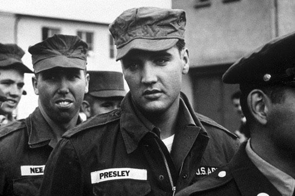 3.) A photo of Elvis Presley in the army.