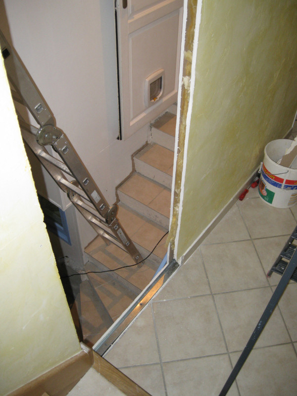 He used this opening as the new entrance up into the attic.