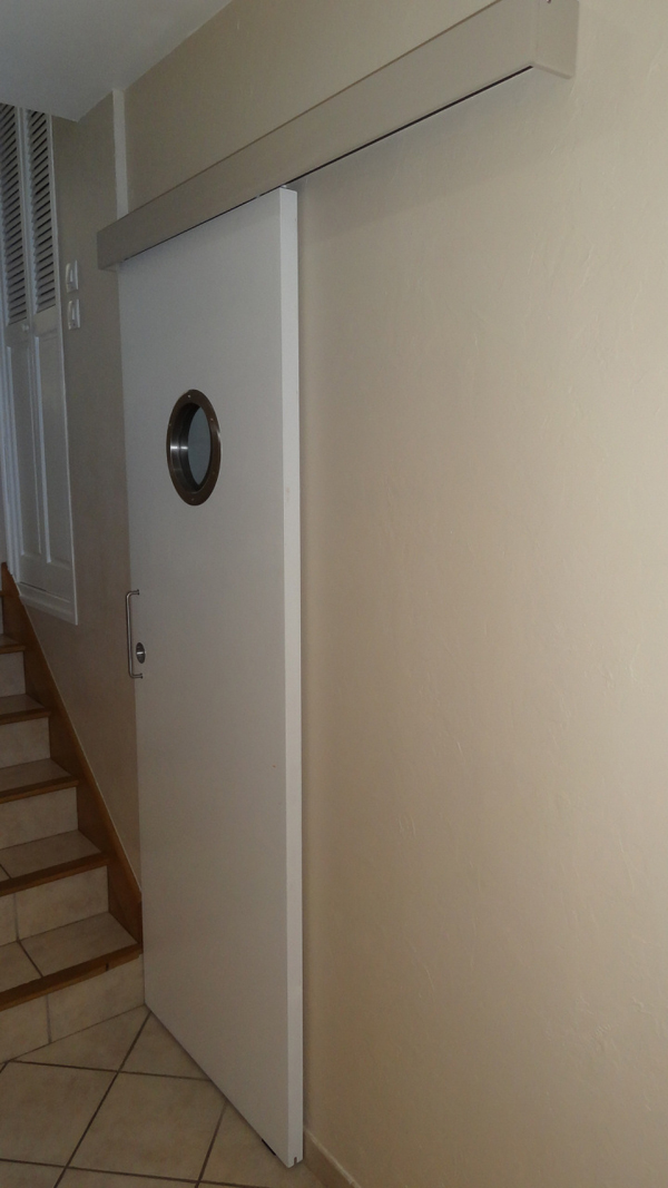 He switched out the door for a sliding one to save space.