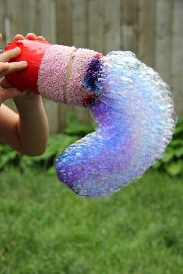 28.) Go outside and let your kids make a rainbow bubblesnake from simple ingredients.