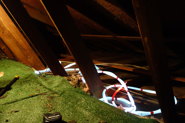 Bundles in the attic. I recommend stretching them in the opposite direction you are installing and laying them flat. One of the most tedious things about the project is trying to pull individual strands from the bundle to install while keeping the rest of the strands from tangling.