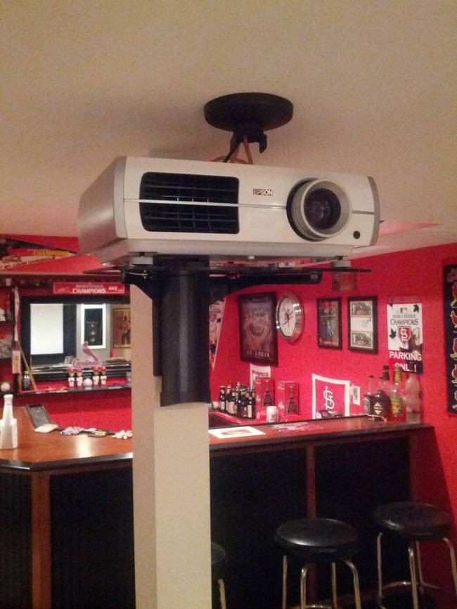 **Updated photo of the new mount on the post.With the previous mount, the projector shook whenever anyone walked around upstairs.**