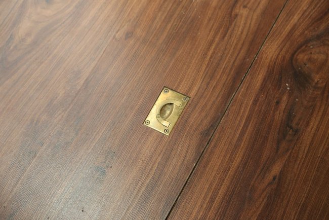 A trap door. Does it lead anywhere?