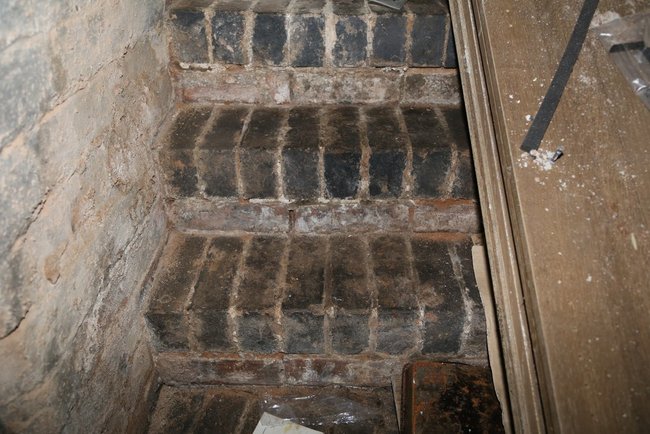 Terrifying stairs leading back up into the apartment.