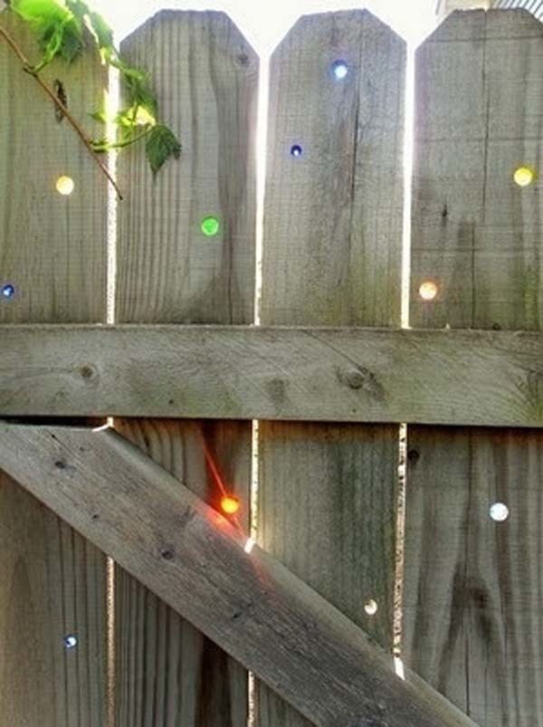 5.) Put marbles in your fence's holes (or drill them yourself).
