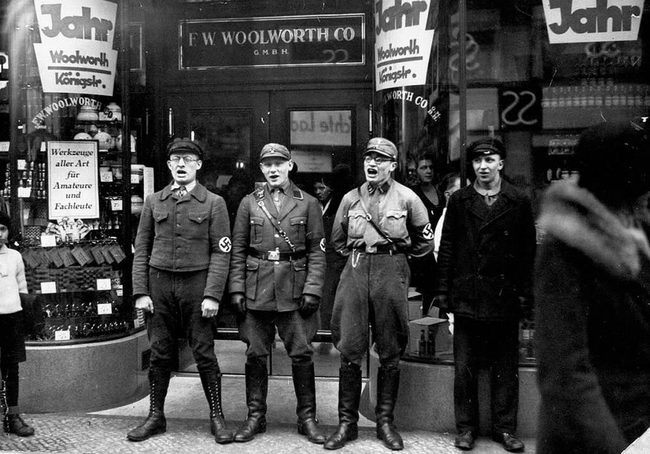 Nazis singing to encourage people to follow their boycott of Jewish shops in 1933.