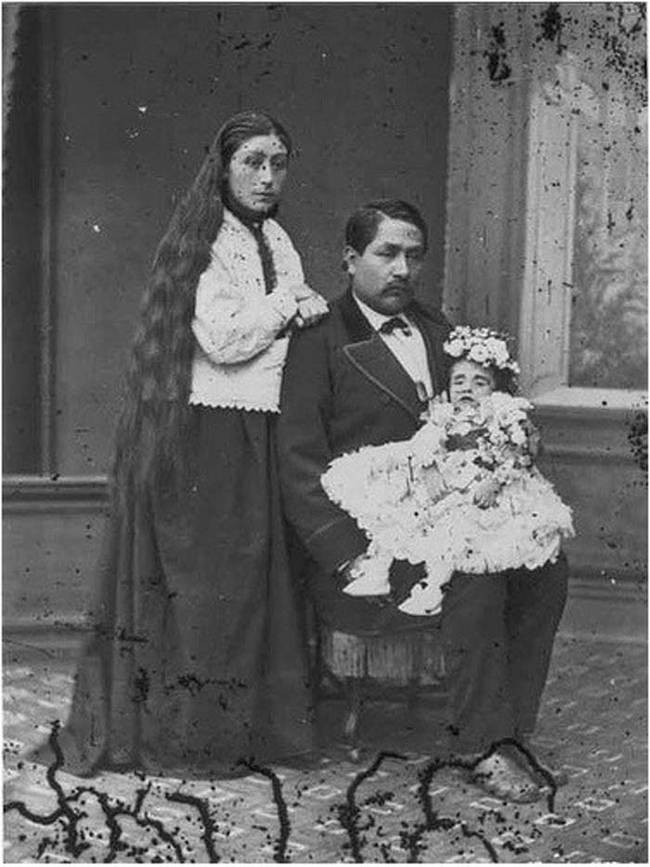 It was common for family members pose with their dead loved ones for these photographs.