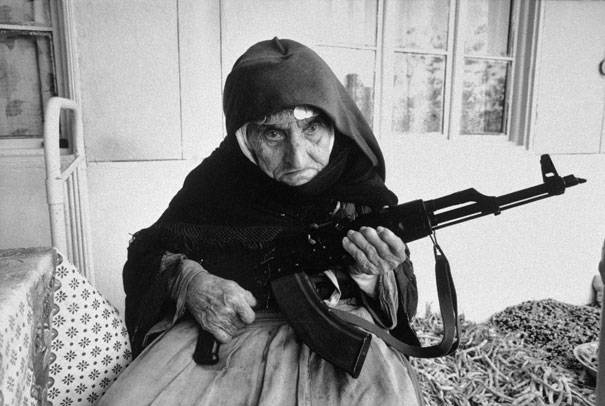 A 106-year-old Armenian woman guards her home in 1990.
