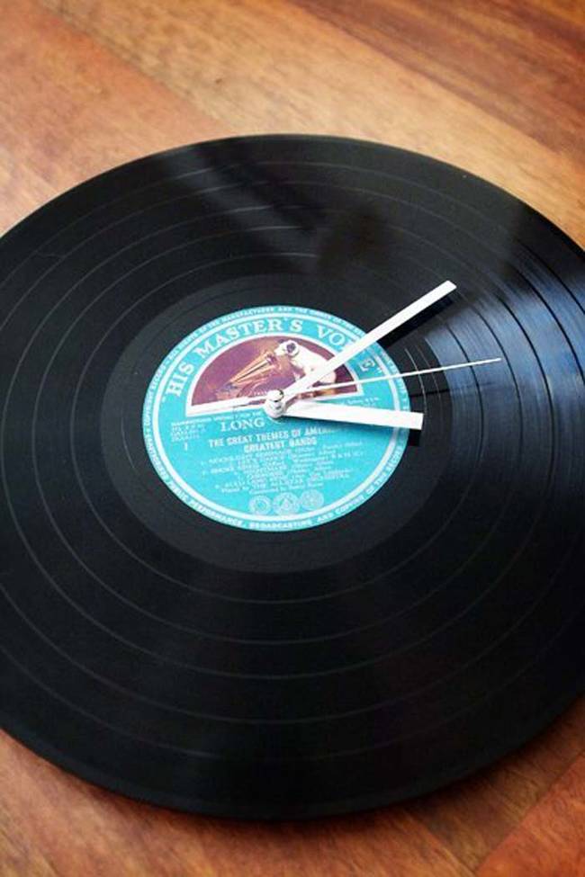 You can pick up a clock mechanism for under $3 and make a clock out of a record.