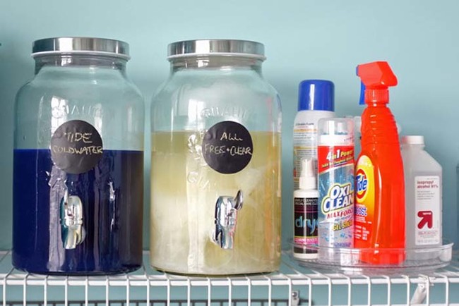 Keep detergent in glass beverage dispensers. It adds some class to your laundry room, and keeps bottle caps from getting slimy. 