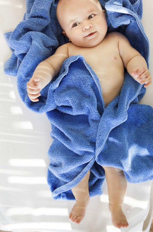 If your towels are feeling old and hard, revive them with vinegar and baking soda instead of detergent.