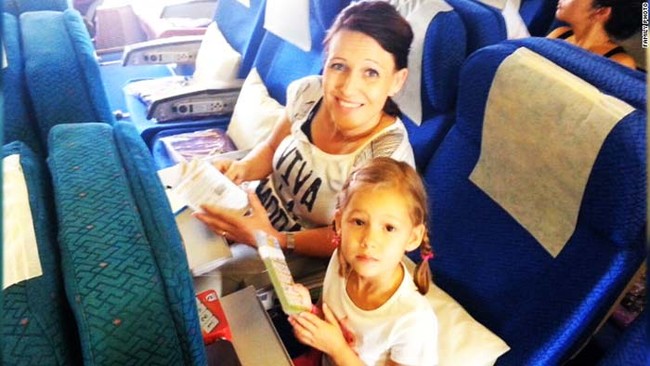 The Hally family before taking off for their dream vacation aboard the doomed MH17 flight, which was downed over Ukraine shortly thereafter.