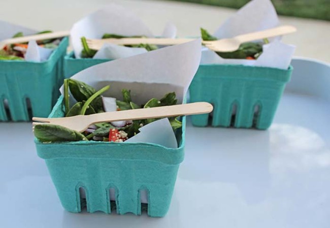 Cardboard berry boxes lined with parchment paper make disposable, eco-friendly salad bowls. 