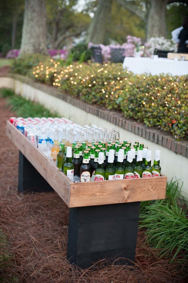 Make a shallow plywood box and set it atop cinder blocks for a bar-like DIY cooler.