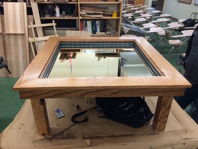 Once the LED lights were installed, he added a two-way mirror to the top.