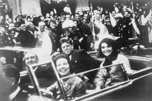 John F. Kennedy as his motorcade toured downtown Dallas
