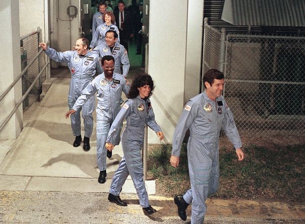 The Space Shuttle Challenger crew on their way to the launch pad.