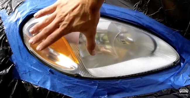 Once you've applied all of your coats, give the headlight a full day to dry. If the coat looks a bit bumpy, you can use the wet sandpaper technique like before with 2000-grit sandpaper.