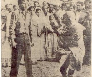 The last photograph of Mahatma Gandhi before his assassination.