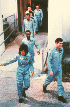 This is the last known photo of the Space Shuttle Challenger Crew boarding the space shuttle. Tragedy would strike 73 seconds into launch as the shuttle's O-ring on it's right booster failed leading to the separation of the Solid Rocket Booster. Extreme aerodynamic forces then broke up the orbiter. The crew compartment survived the break but the impact with the ocean surface was too violent to be survivable.