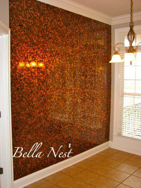 Go bold with your loose change and make a wall of it.