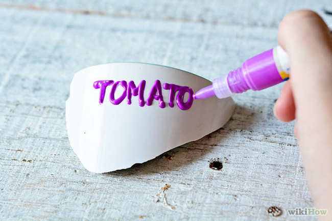 Repurpose broken pots into plant markers.