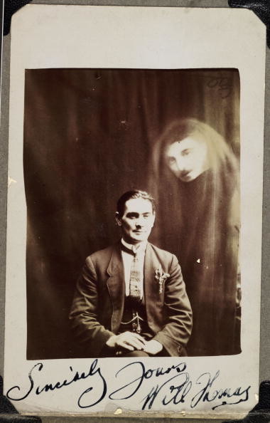 A photograph of Will Thomas, taken by William Hope (1863-1933), with a ghost in the background (that they apparently really wanted to include).