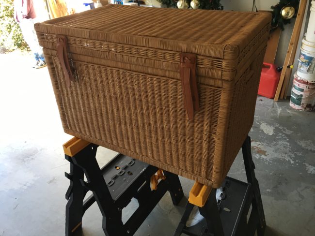 It started with a wicker chest. He didn't know what to do with it, but when he looked at the cat box, he had an idea. Why not convert the chest into a litter box?