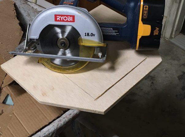 He did the same for the door panel, and then cut another square out of that piece to accommodate the actual kitty door.