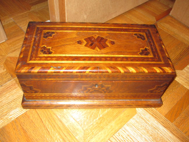 They tried to open it only to realize it was locked tight. Not having any idea how old and delicate it was they decided not to force it open and risk ruining the box itself.