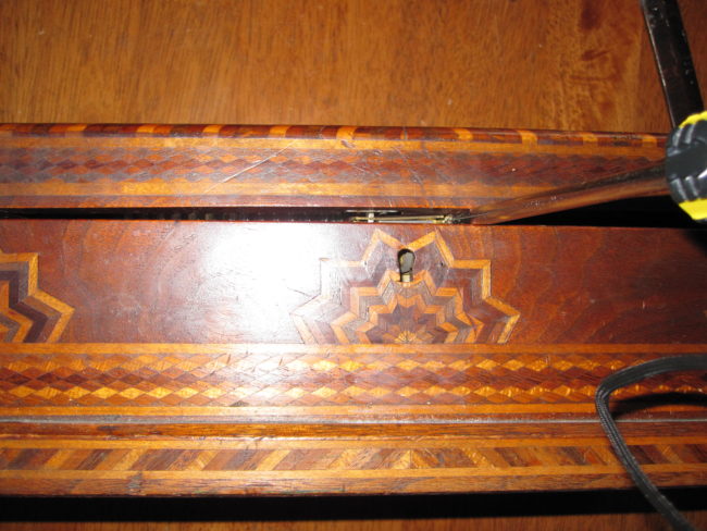 Using a screwdriver and a hammer, Matt got the box open in no time at all.