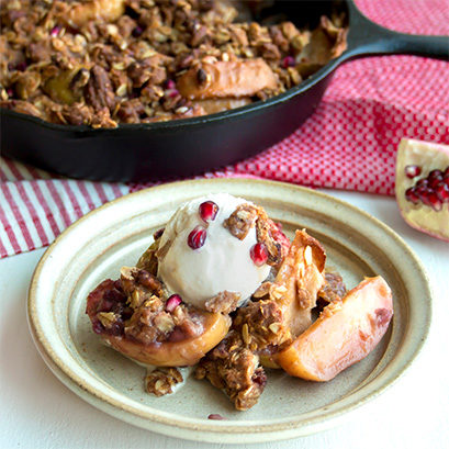This apple pomegranate crisp with ice cream is completely to die for.