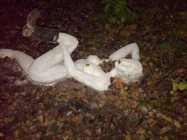 A statue with gold nipples.