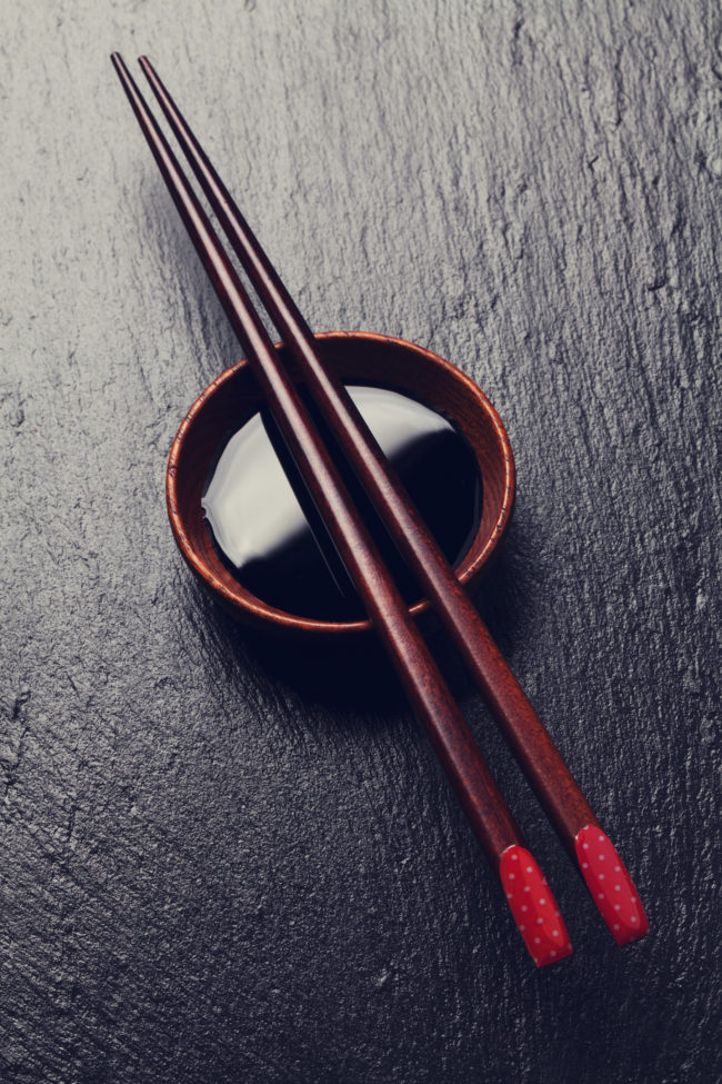 Tan Teck Soon pushed his girlfriend off a 12-story building over an argument about chopsticks and then jumped after her.