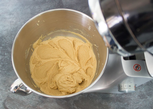 Then, sift together flour, baking soda, baking powder, and salt and set it aside. In your mixer, beat butter and sugar until smooth. After that, add the peanut butter.
