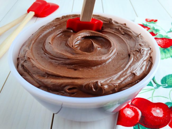 Ice a cake with this buttercream frosting that utilizes melted chocolate.