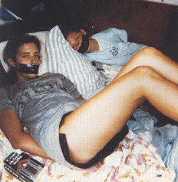 In June 1989, this Polaroid photo was found in the parking lot of a convenience store in Port St. Joe, Florida.The identities of the bound and gagged individuals have never been confirmed, but the young woman is believed to be 19-year-old Tara Calico, who disappeared in 1988.According to Calico's mother, the book in the picture was one of her favorites.