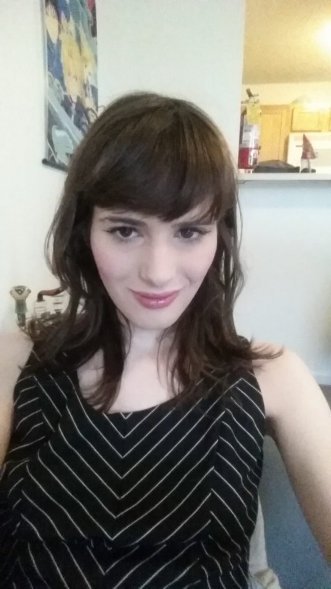 At 16 months, she bravely decided to start wearing makeup and dresses in public.