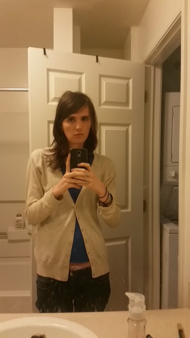 At 14 months, she was wearing more feminine clothes, as well.