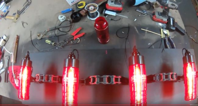 Then he just needed to sand the backs of the bottles a little before using epoxy to glue them to the tubing.He made sure to use LED tube lights -- otherwise the bottles might've melted!