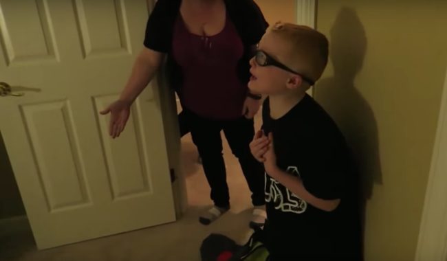 In this screenshot from a now-deleted video, the parents are yelling and cursing at one of their children after finding ink all over his carpet. This was actually a "prank" set up by the parents, who eventually tell the boy that it's not real after he becomes visibly distressed.