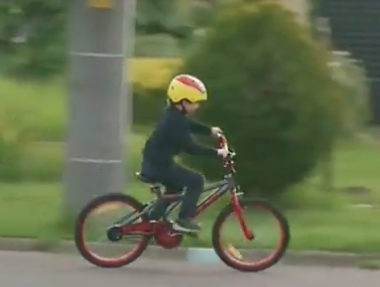 He rode his bike for nearly two miles before they caught up with him.