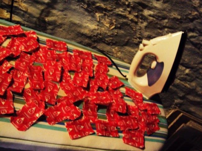 Then she separated them out by color and carefully ironed them flat.