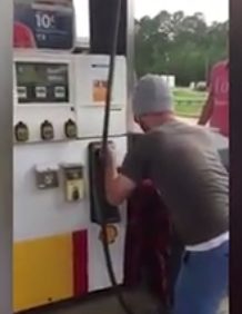 He used the end of the nozzle to face it away from him so that he could easily grab it from behind its head.