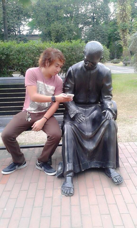 Technology's changed a lot in the last hundred years, so these statues have some catching up to do.