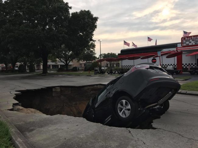 The resulting sinkhole reportedly caused a gas line to rupture.