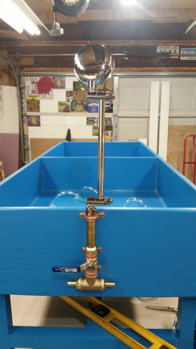 To give his little girl a water source to play with, Dad screwed in copper piping and attached an adjustable shower head to one side.