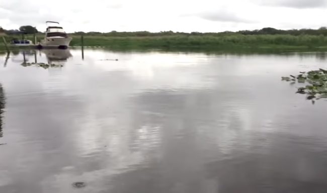 The waters were relatively calm as they prepared to dry out their waterlogged boat.