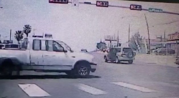 As the SUV turned right, the rear left door opened, ejecting the little boy along with his car seat.